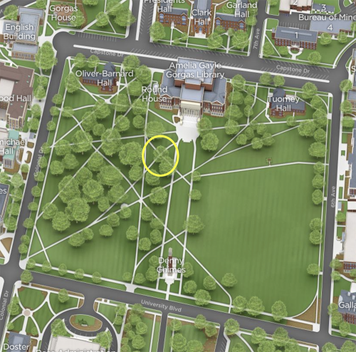 illustrated map with yellow circle on upper mid left of The Quad