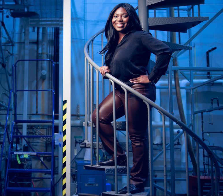 A Student in a machine shop environment