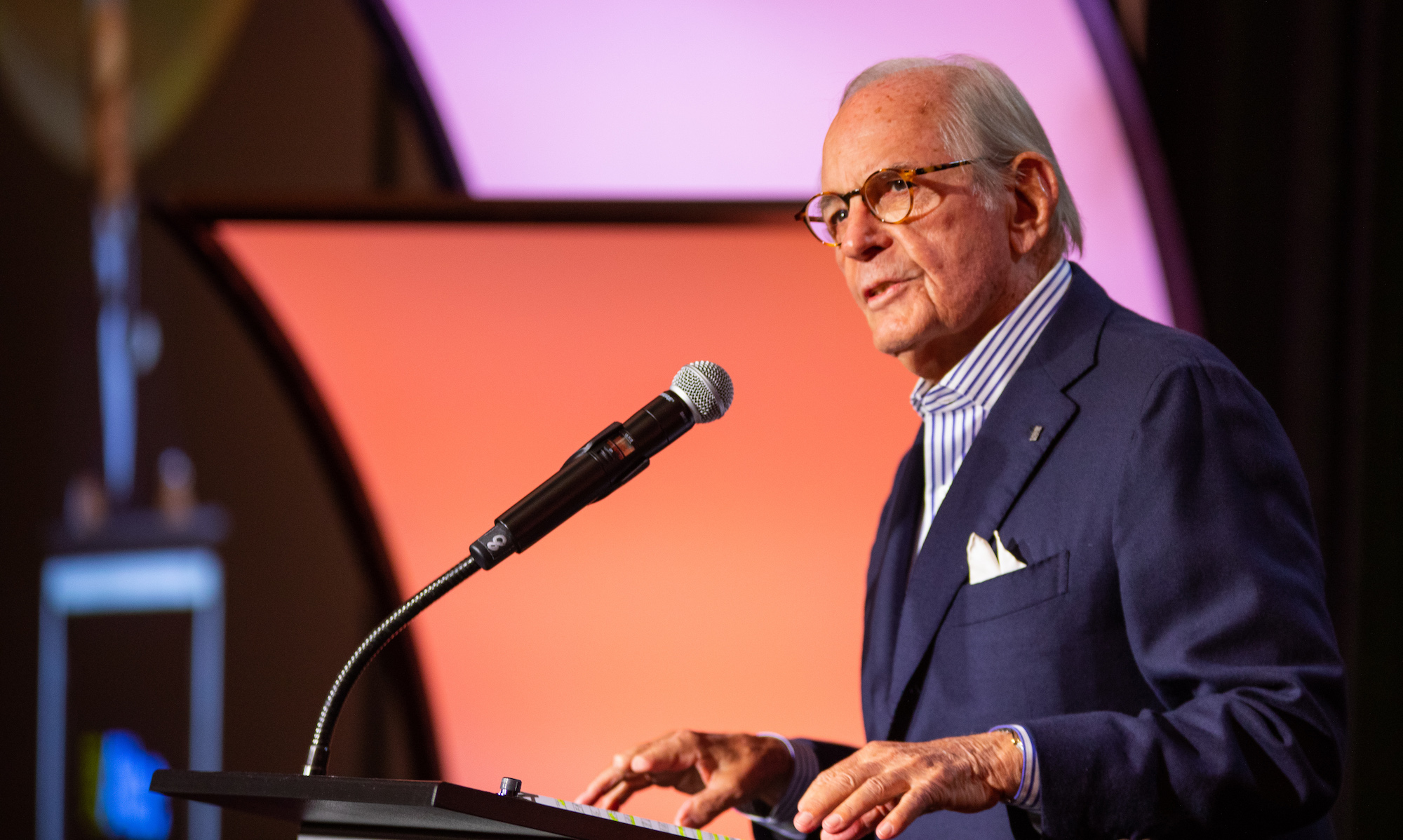 Styslinger talking at a podium